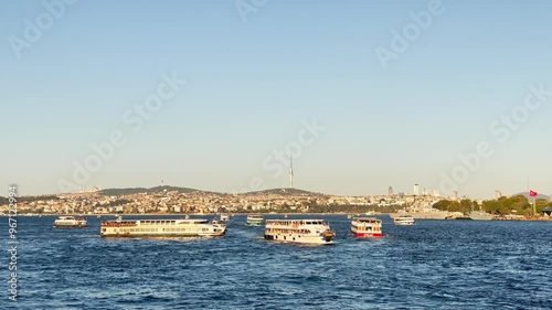 People walking from Galata Bridge to Eminönü on the Bosphorus in Istanbul, Turkey photo