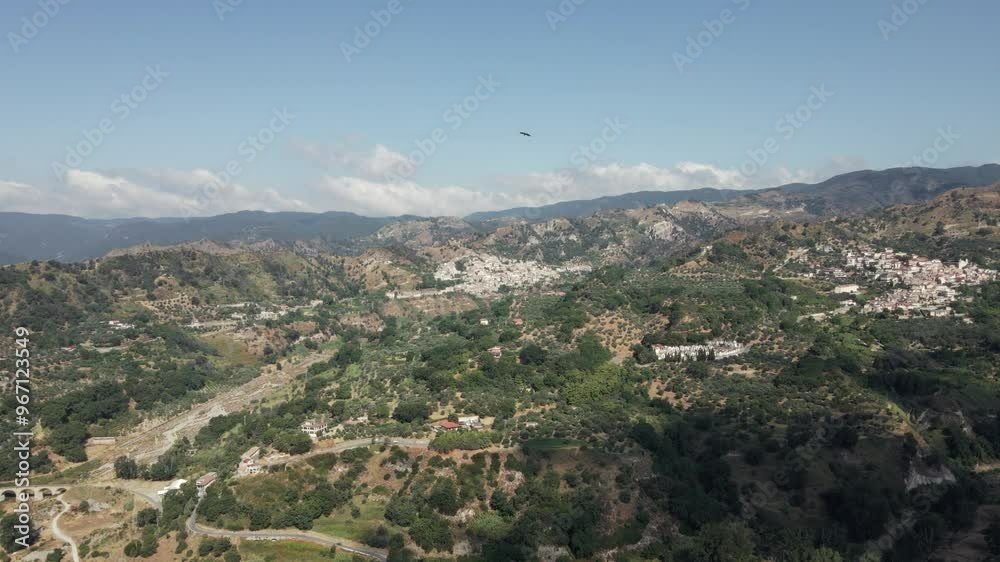 A falcon flies overhead as we push deeper into the mountains and old towns of Calabria in southern Italy. A falcon flies overhead as we push deeper into the mountains and old towns of Calabria in southern Italy.