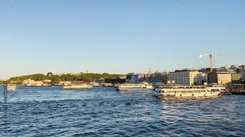 People walking from Galata Bridge to Eminönü on the Bosphorus in Istanbul, Turkey People walking from Galata Bridge to Eminönü on the Bosphorus in Istanbul, Turkey