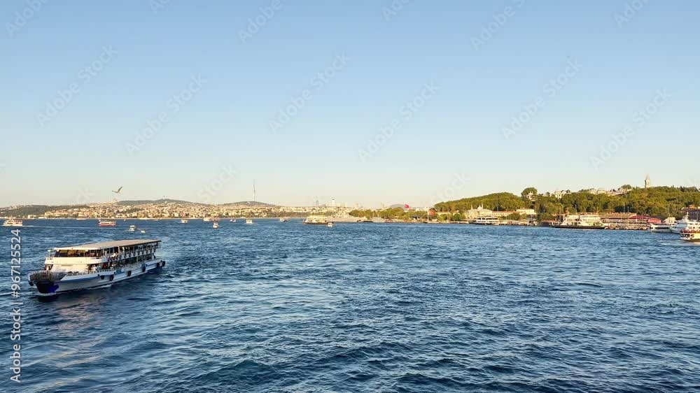 People walking from Galata Bridge to Eminönü on the Bosphorus in Istanbul, Turkey People walking from Galata Bridge to Eminönü on the Bosphorus in Istanbul, Turkey