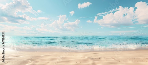 Fototapeta Naklejka Na Ścianę i Meble -  A serene scene with beige sand and a tranquil blue sea under the sunny sky ideal for adding a copy space image