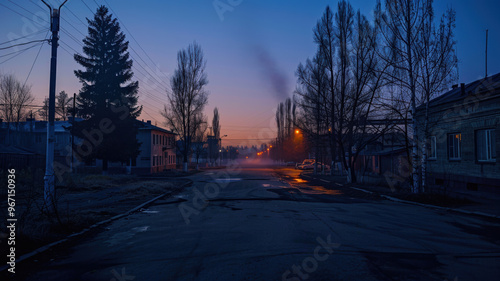 In the early morning gloom, a three-story school and surrounding Khrushchev-era buildings are lit by cold blue lights and eerie orange lampposts, creating an oppressive atmosphere.