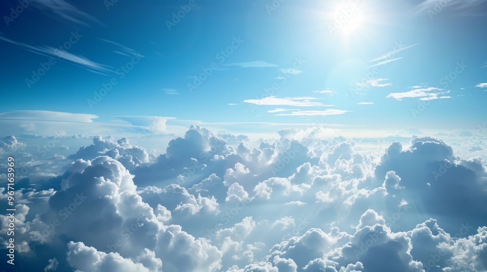 Stunning Photograph of Sunlit Sky with Majestic Clouds in Serene Blue Atmosphere Stunning Photograph of Sunlit Sky with Majestic Clouds in Serene Blue Atmosphere