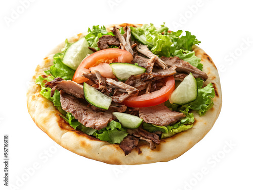 a meat and vegetables on a flatbread