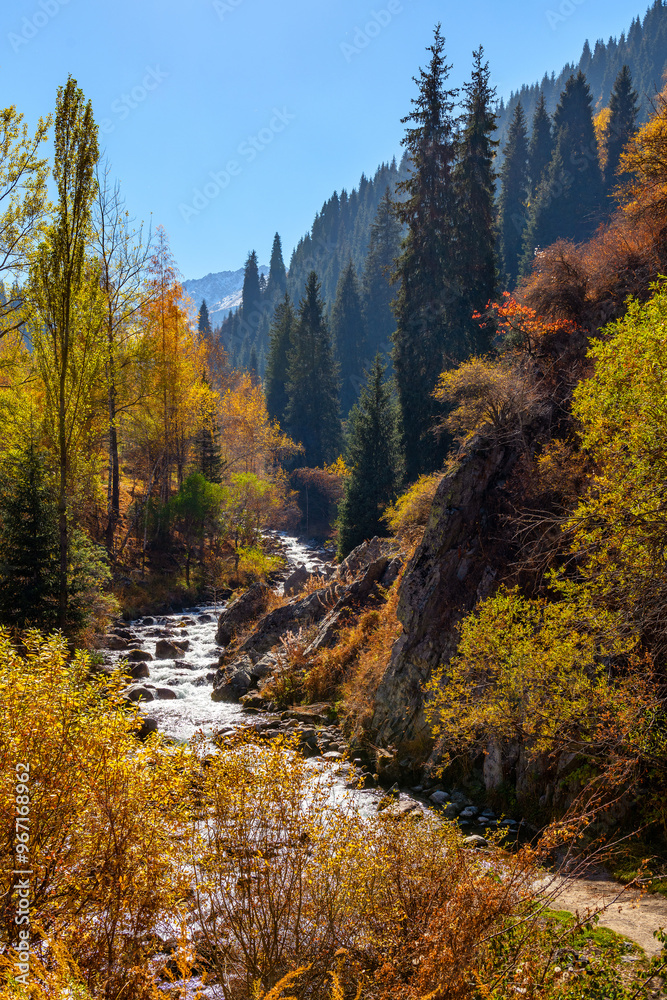 Mountain river on an autumn day in the vicinity of the Kazakh city of Almaty Mountain river on an autumn day in the vicinity of the Kazakh city of Almaty