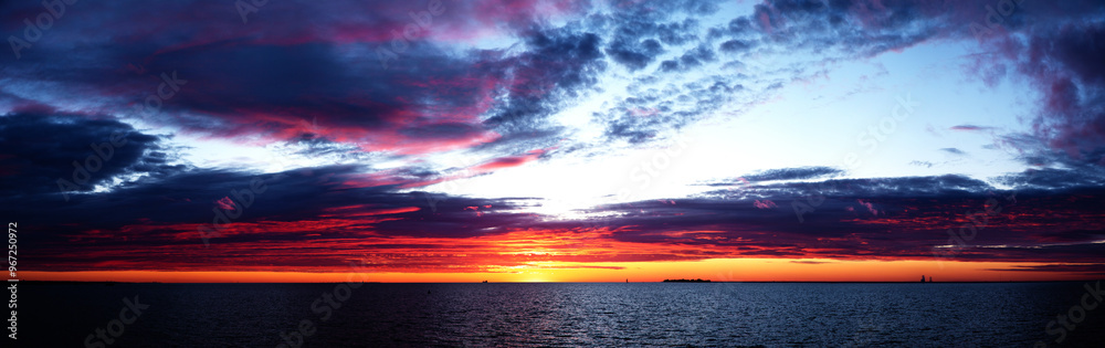 Obraz premium fabulous sunset, colorful clouds in the sky on a summer evening