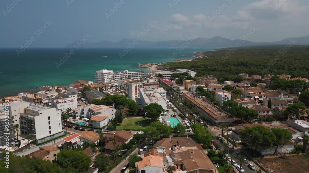A cinematic drone shot moving forward through Can Picafort’s Av. Diagonal, revealing palm-lined streets and the vibrant cityscape with the sparkling sea in the background. A cinematic drone shot moving forward through Can Picafort’s Av. Diagonal, revealing palm-lined streets and the vibrant cityscape with the sparkling sea in the background.