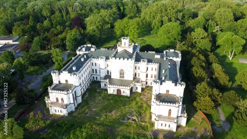 Stunning 4K drone footage of Zichyho Mansion in Rusovce, Slovakia. Enjoy breathtaking aerial views of this historic manor surrounded by beautiful gardens and lush greenery photo