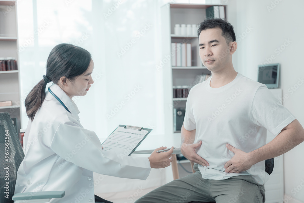 Fototapeta premium Asian female doctor and male patient discuss treatment with successful professional physician wearing white lab coat and stethoscope about injury