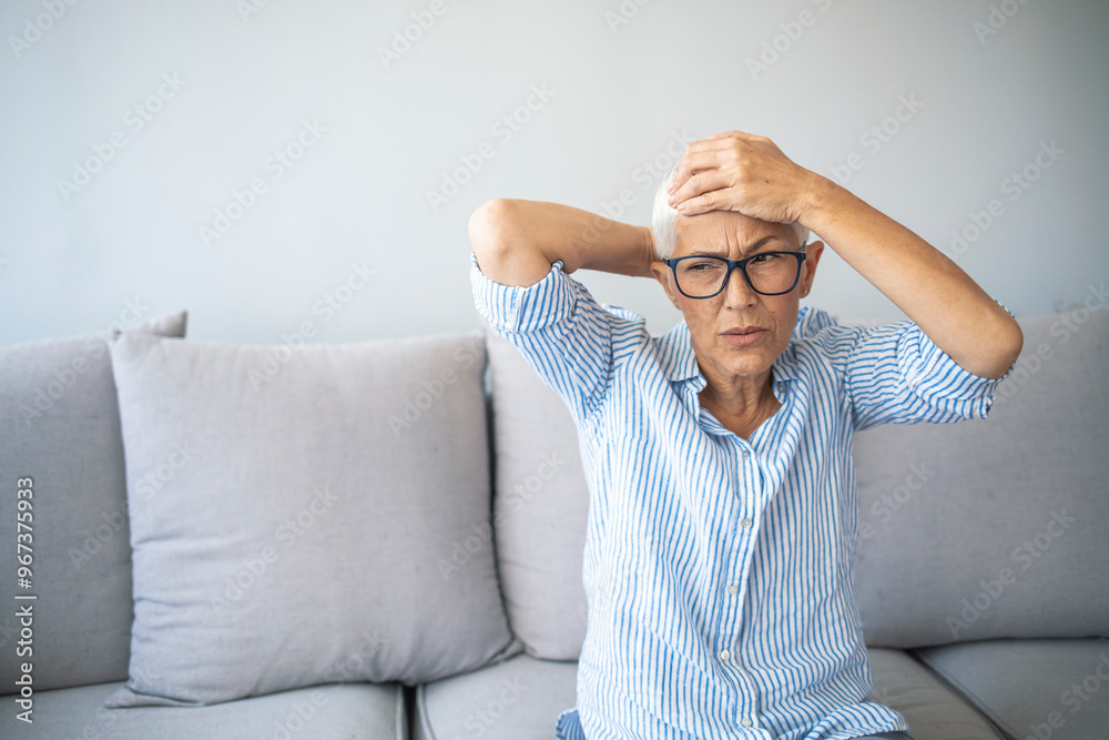 custom made wallpaper toronto digitalSenior Woman Experiencing Stress on Sofa at Home