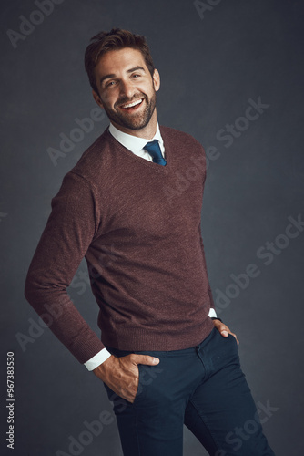 Employee, man and happy on portrait for fashion in studio on gray background as lawyer in Spain. Business person, proud and smile in confidence on career growth or opportunity with style and elegant