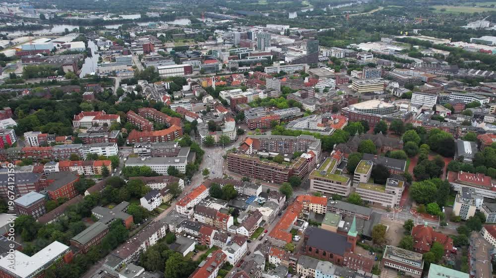 Aerial view around the old town of the city Harburg beside Hamburg on a cloudy noon on a summer in Germany. Aerial view around the old town of the city Harburg beside Hamburg on a cloudy noon on a summer in Germany.