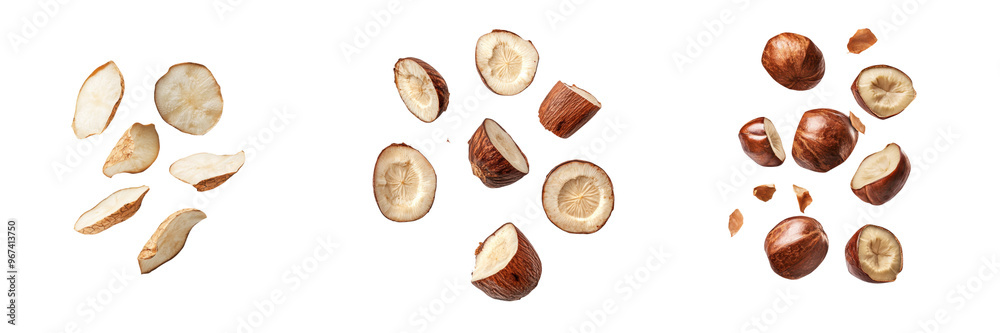 Assortment of sliced raw hazelnuts displayed against a white background in three different groups. Assortment of sliced raw hazelnuts displayed against a white background in three different groups.