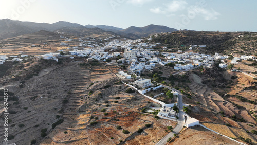 Aerial drone photo of picturesque main village of Kimolos island built next of port Psathi, Cyclades, Greece photo