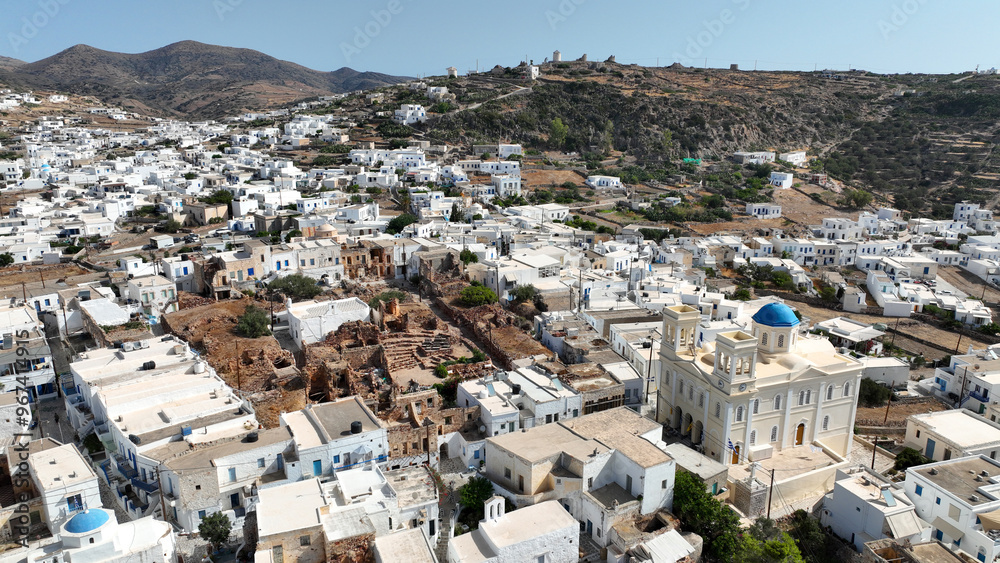 Aerial drone photo of picturesque main village of Kimolos island built next of port Psathi, Cyclades, Greece Aerial drone photo of picturesque main village of Kimolos island built next of port Psathi, Cyclades, Greece