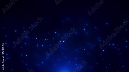 Blue particles of light on a dark blue background