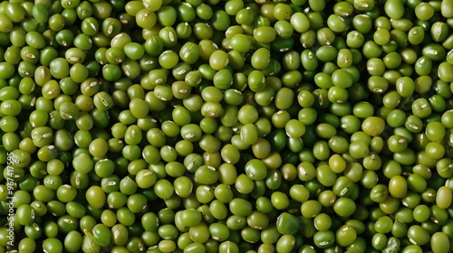 Close up view of raw green mung beans on square food backdrop