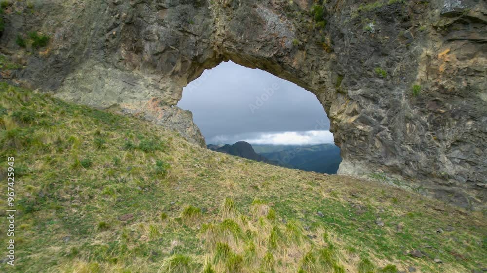 Rock-arch in the Caucasus mountains. Landscape and nature of the North Caucasus Rock-arch in the Caucasus mountains. Landscape and nature of the North Caucasus