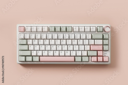 Obraz na płótnie Modern mechanical keyboard on pink background. Minimal style and design keyboard. Custom build keyboard. Colorful key pastel creamy pink and green cap. Top view. w salonie