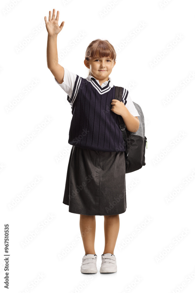 Schoolgirl in a uniform carrying a backpack and waving Schoolgirl in a uniform carrying a backpack and waving