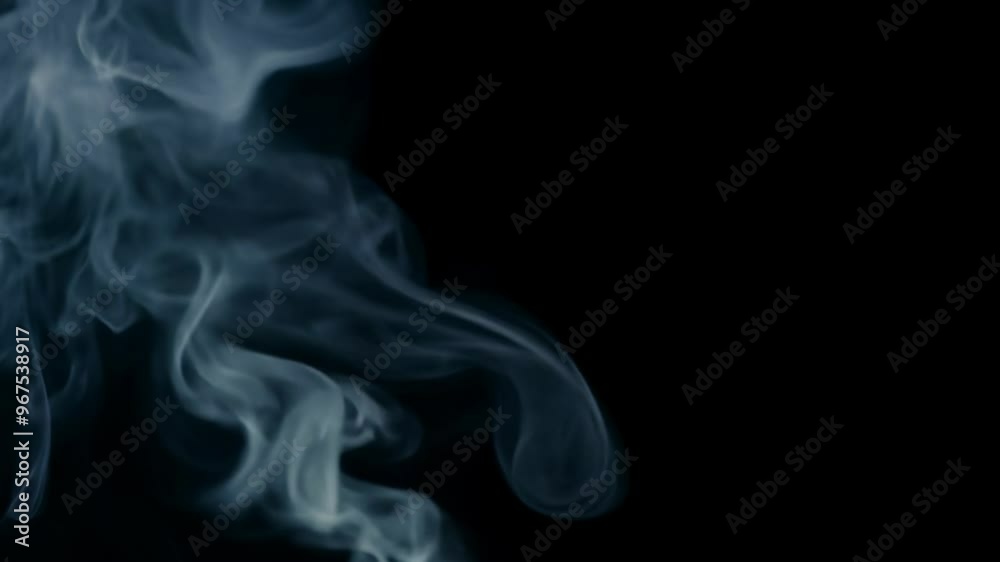 Smoke swirling on black background. Effect overlay. Smoke swirling on black background. Effect overlay.
