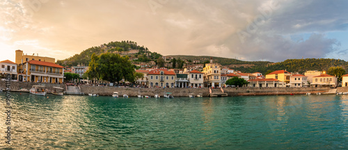 Panoramic view of Nafpaktos in Greece against a dramatic sky.
 photo