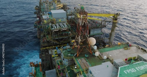 Macao, Brazil - 01 August 2024: Aerial view of the industrial offshore support vessel FPSO FORTE surrounded by ocean waves, Macae, Brazil.