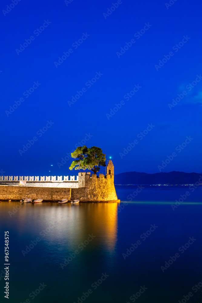Nafpaktos port in Greek during blue hour. A famous touristic destination.