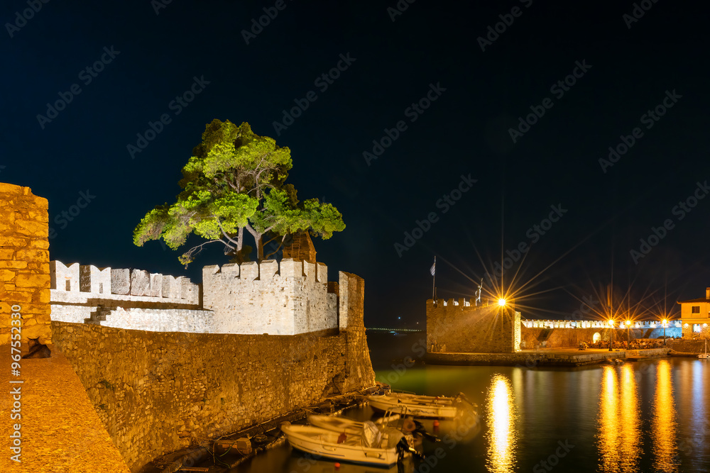 Night view of the port of Nfpaktos in Greece.