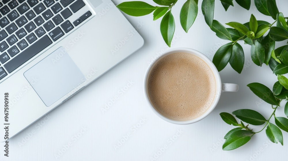 Office desk table with lots of items on top, seen from the top