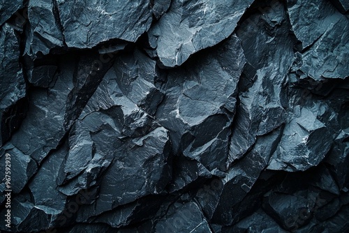 A closeup of a black rock surface at night, highly detailed, good for background 