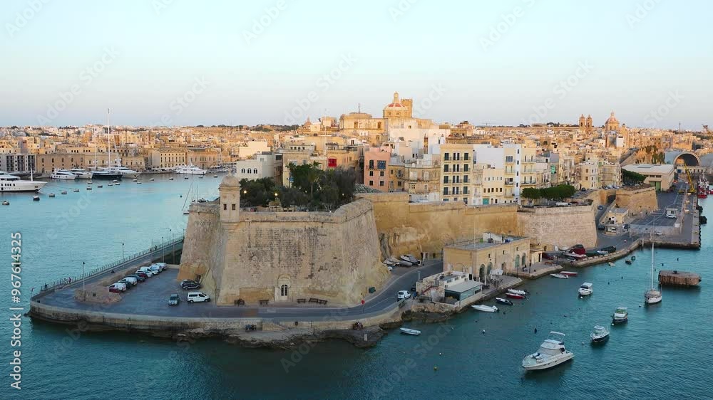 Exploring the stunning coastal views and historical architecture of Valletta, Malta at sunset Exploring the stunning coastal views and historical architecture of Valletta, Malta at sunset