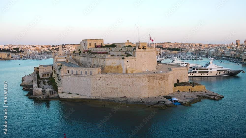 Exploring the stunning coastal views and historical architecture of Valletta, Malta at sunset Exploring the stunning coastal views and historical architecture of Valletta, Malta at sunset