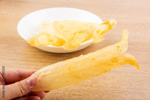 A plate of fish maw and basa fish maw photo