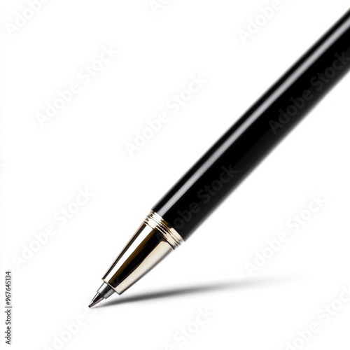 A sleek black pen with a shiny silver tip, perfect for writing, signing documents, or making notes in a stylish manner. photo