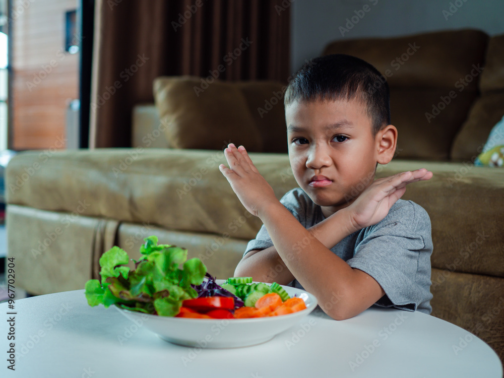 Children do not like to eat vegetables, Little cute boy refuses to eat healthy vegetables, Nutrition healthy eating habits for kids concept, Children do not like to eat vegetables. Children do not like to eat vegetables, Little cute boy refuses to eat healthy vegetables, Nutrition healthy eating habits for kids concept, Children do not like to eat vegetables.