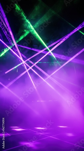 Dynamic Light Show with Purple and Green Lasers Cutting Through Fog.