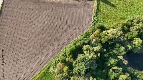 Flug über ein Waeldchen und ueber, Felder photo