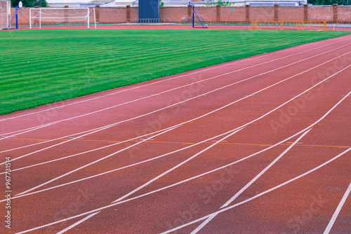 athletic running track around soccer field sport complex urban empty space without people