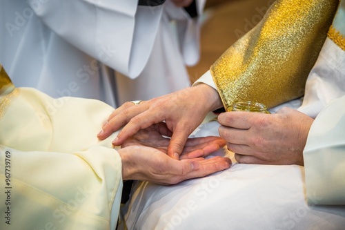 Anointing of the hands. photo