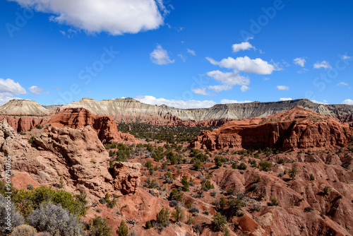 Explore the breathtaking red rock formations of Kodachrome Basin State Park, Utah. This captivating landscape features vibrant sandstone buttes set against a clear blue sky - USA