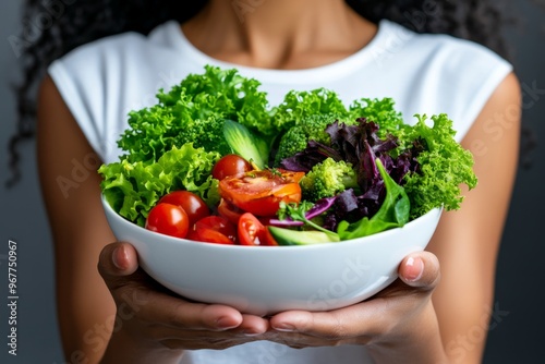 A person practicing intuitive eating, focusing on mindful food choices and listening to their body's hunger and fullness cues photo