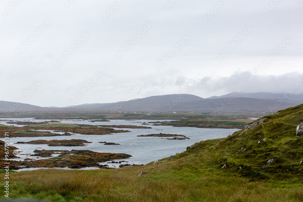 Landscape view of south Uist, Image shows a beautiful scenic photo of the remote Scottish island coastline during the summer Landscape view of south Uist, Image shows a beautiful scenic photo of the remote Scottish island coastline during the summer