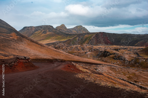 Colorful Volcanic Landscape with Winding Dirt Road