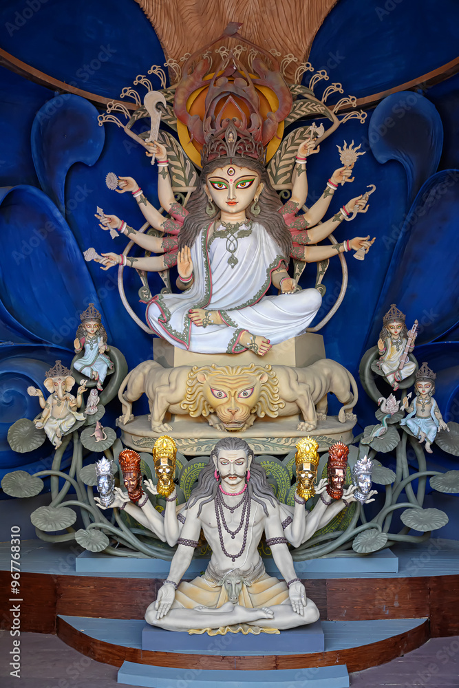 Fototapeta premium Beautiful idol of Goddess Devi Durga takes centre stage during the Durga Puja festival of Hinduism in Kolkata, West Bengal, India