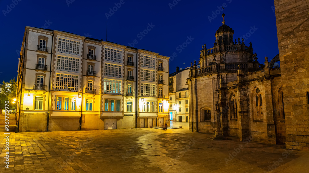 Fototapeta premium Main square of the city of Lugo at night with picturesque buildings and Gothic cathedral, Galicia.