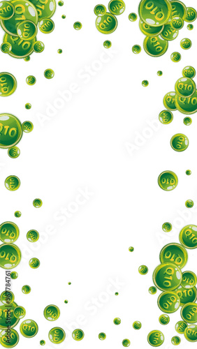 Vitamin Q10 round capsules scattered randomly.