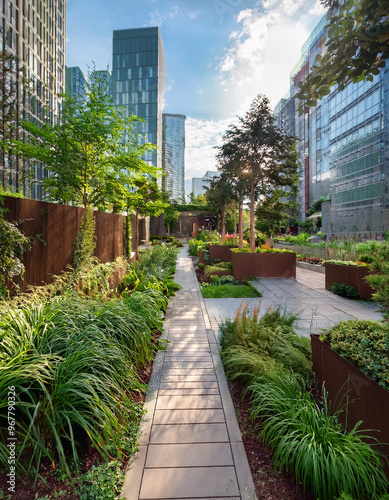 The greenery showcases a sustainable urban design with rain gardens and permeable surfaces strategically placed for managing stormwater runoff
