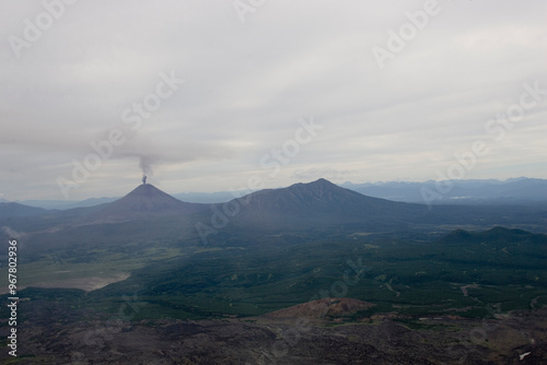 Russia Kamchatka volcano eruption on a cloudy summer day