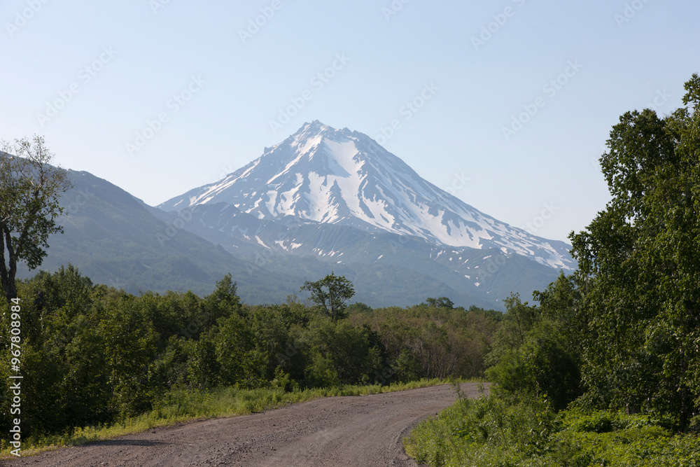 Fototapeta premium Russia Kamchatka volcano Vilyuchinsky on a cloudy summer day